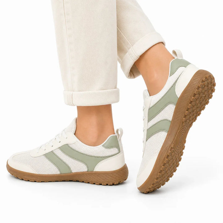 Lightweight women's barefoot walking shoes, flexible and supportive for natural movement.