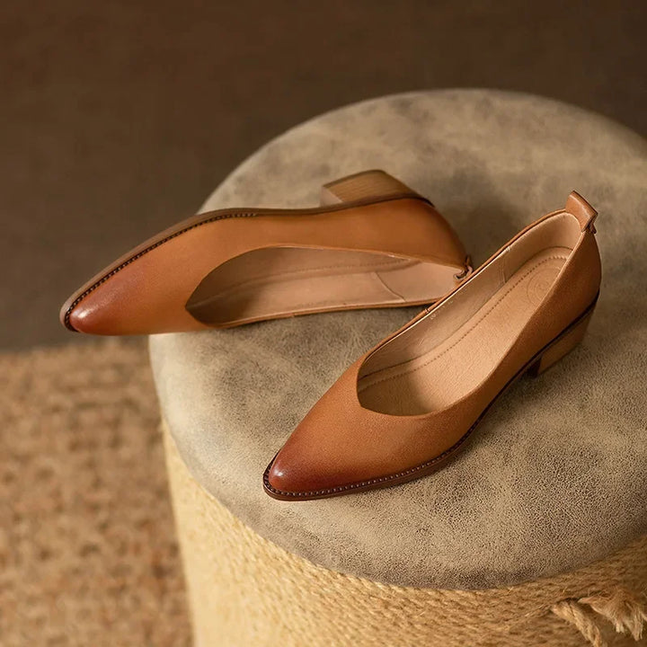 Professional women's pointed toe block heel court shoes for office wear, comfortable & stylish.