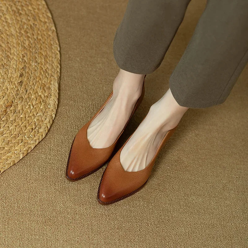 Comfortable women's pointed toe slip-on block heel court shoes, designed for elegant long-lasting wear.