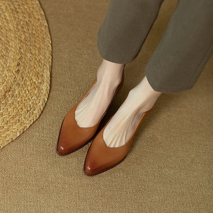 Comfortable women's pointed toe slip-on block heel court shoes, designed for elegant long-lasting wear.