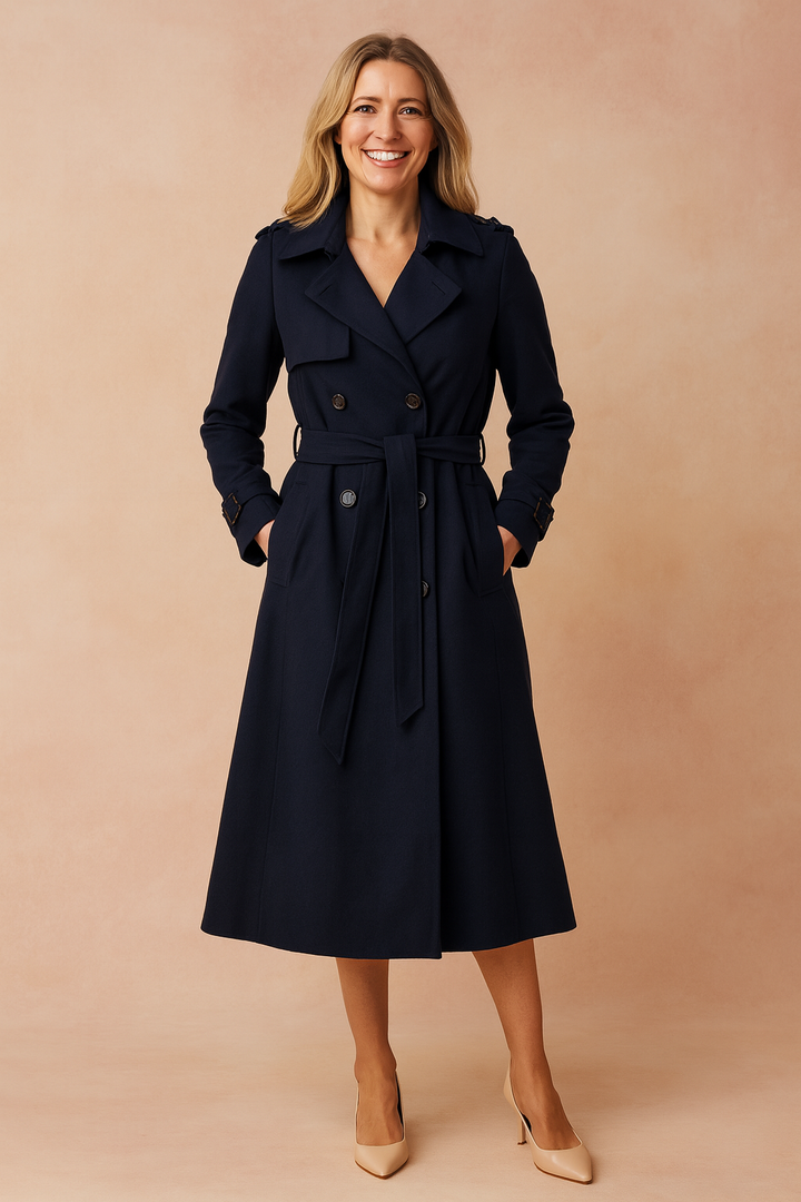 Classic women's belted trench coat, showing the elegant back detail and adjustable waist, for versatile style.