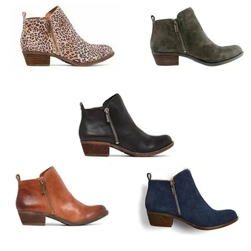 Faux leather women's ankle boots with a rounded toe, block heel, and side zip, ideal for casual fashion.