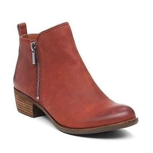 Fashionable women's ankle boots with a sturdy block heel, sleek design, and side zip, suitable for modern ladies.