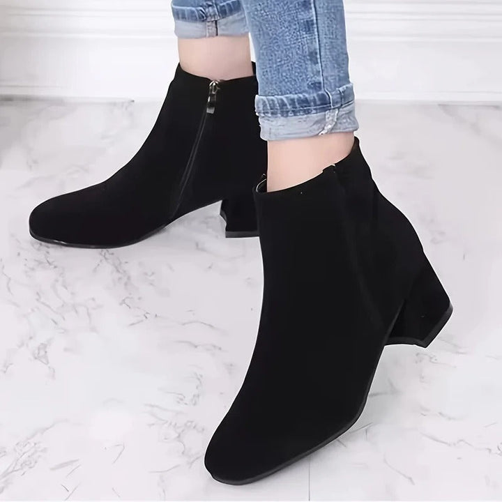 Practical women's ankle boots: comfortable block heel & convenient side zip for everyday wear.