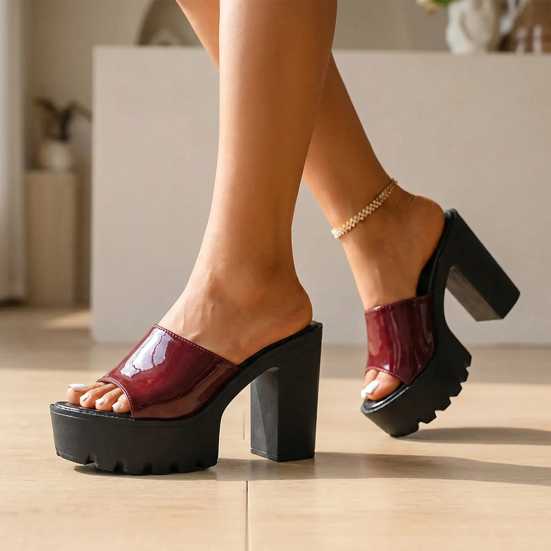Women's black chunky platform block heel sandals with open toe, ideal for evening wear & parties.