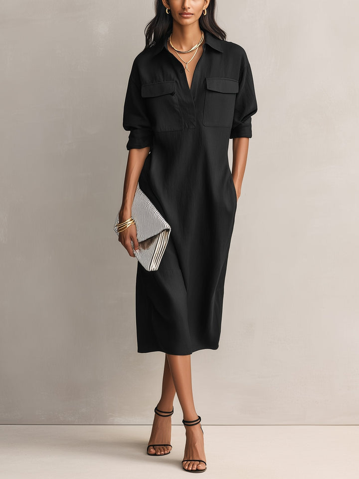 Women's black collared midi shirt dress with elbow sleeves, perfect for casual everyday wear. Relaxed fit.