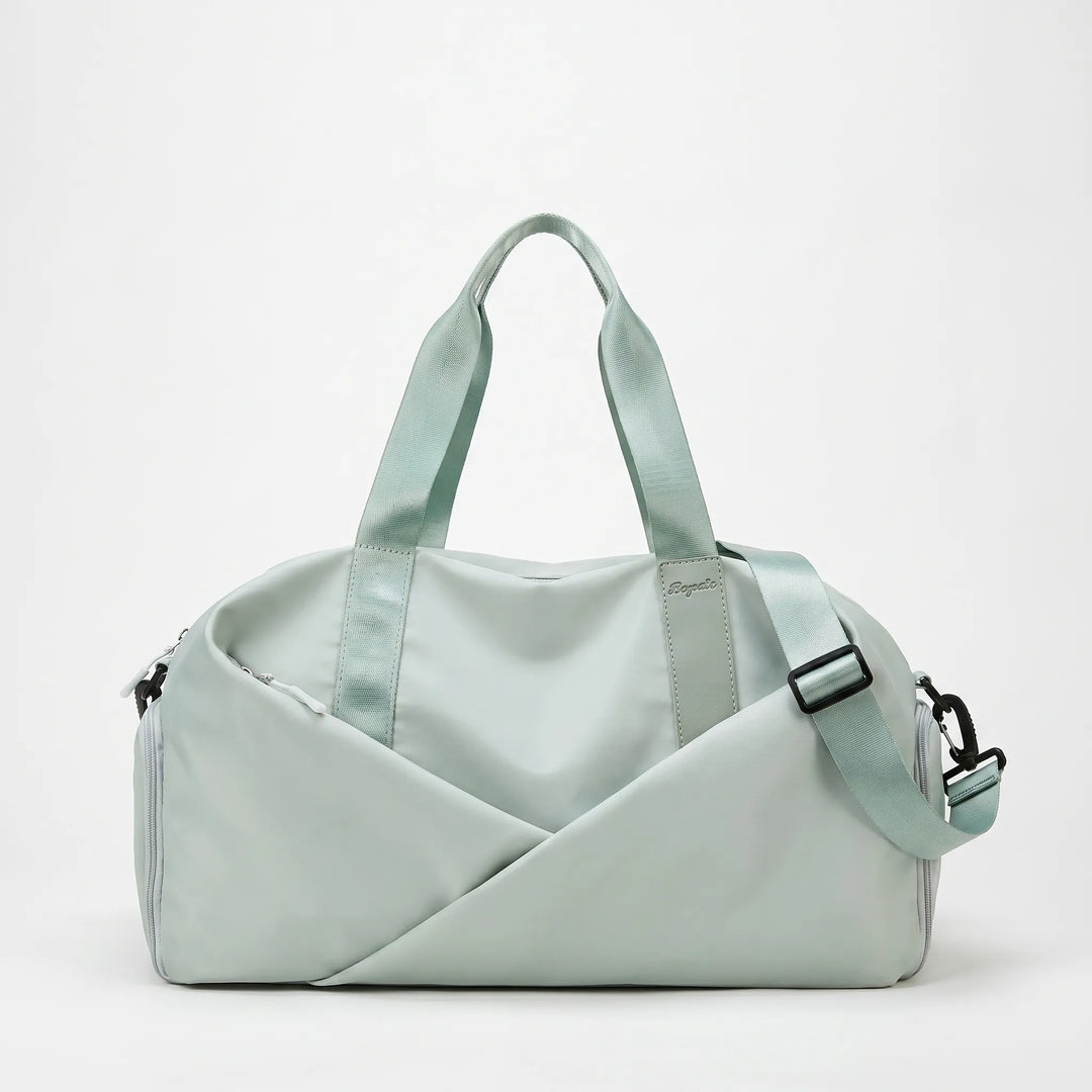 Stylish nylon women's gym duffel bag with separate shoe compartment for activewear, ideal for sports & travel.