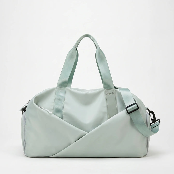 Stylish nylon women's gym duffel bag with separate shoe compartment for activewear, ideal for sports & travel.