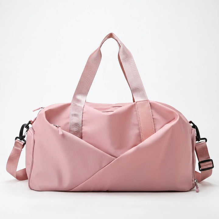 Durable women's fitness duffel bag, large capacity, features an accessible shoe compartment.
