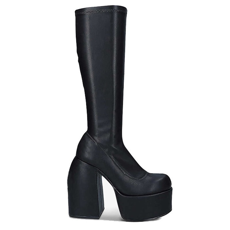 Women's black heeled ankle boots with a sleek design, perfect for elevating any fashion-forward or edgy outfit.