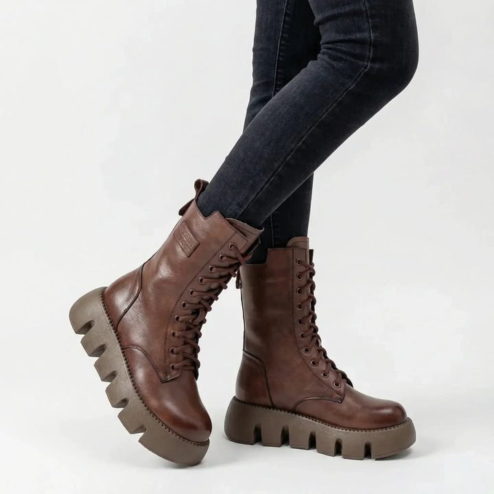 Fashionable women's platform combat boots, lace-up design, with arch support for fall and winter comfort.