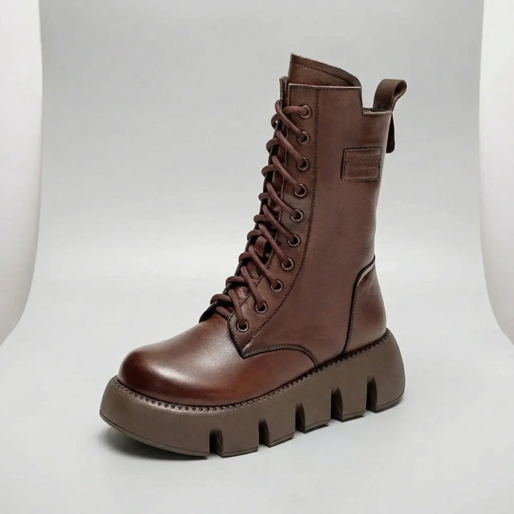 Women's combat boots featuring sturdy lace-up design, elevated platform, and supportive arch for daily wear.
