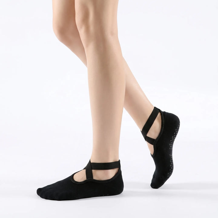 Comfortable women's non-slip grip socks for enhanced yoga & pilates studio performance.