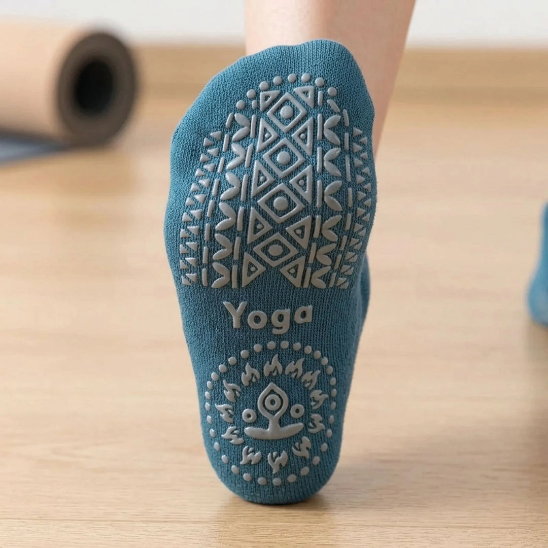 Secure women's non-slip athletic socks with studio grip for yoga, pilates, and barre safety.