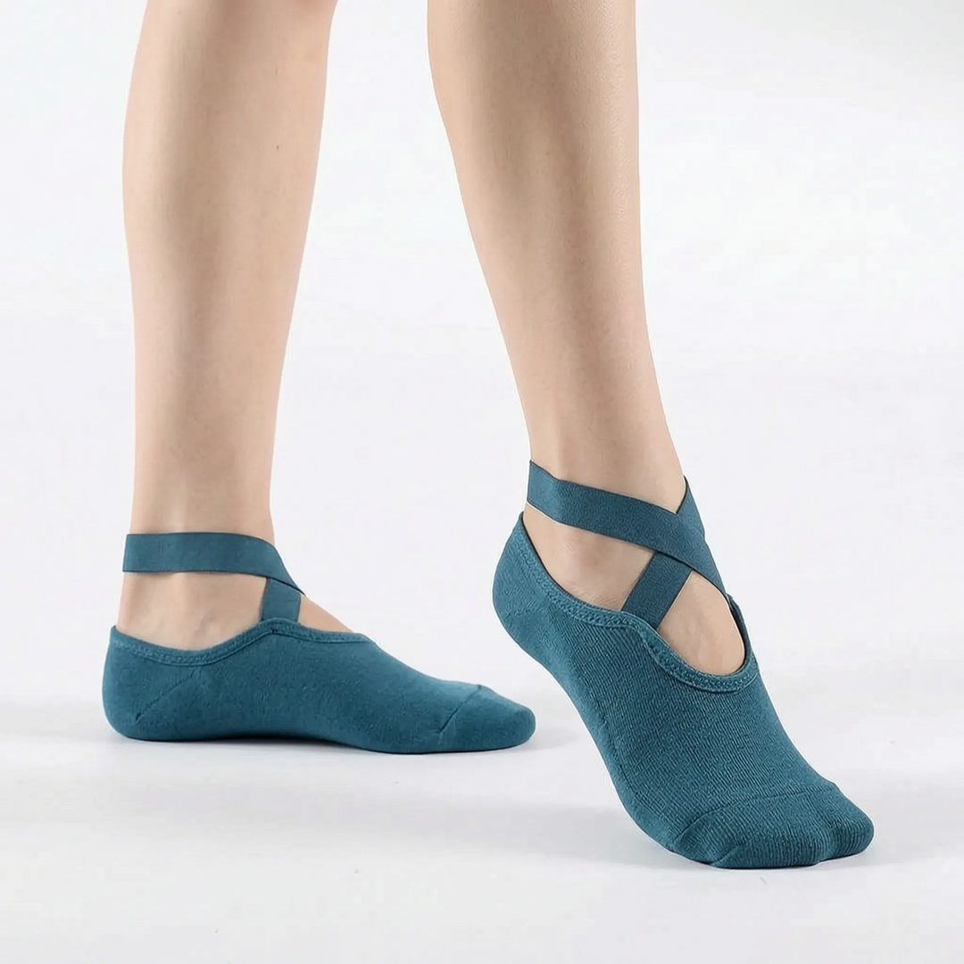 Enhance grip with women's non-slip yoga & pilates studio socks, perfect for barre workouts.