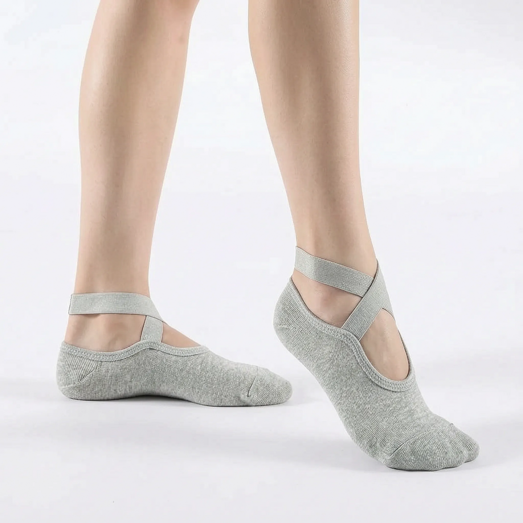 Women's non-slip black grip socks for yoga, pilates, and studio fitness.