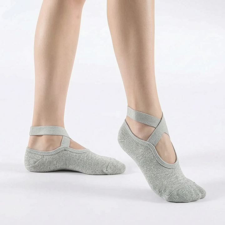 Women's non-slip black grip socks for yoga, pilates, and studio fitness.