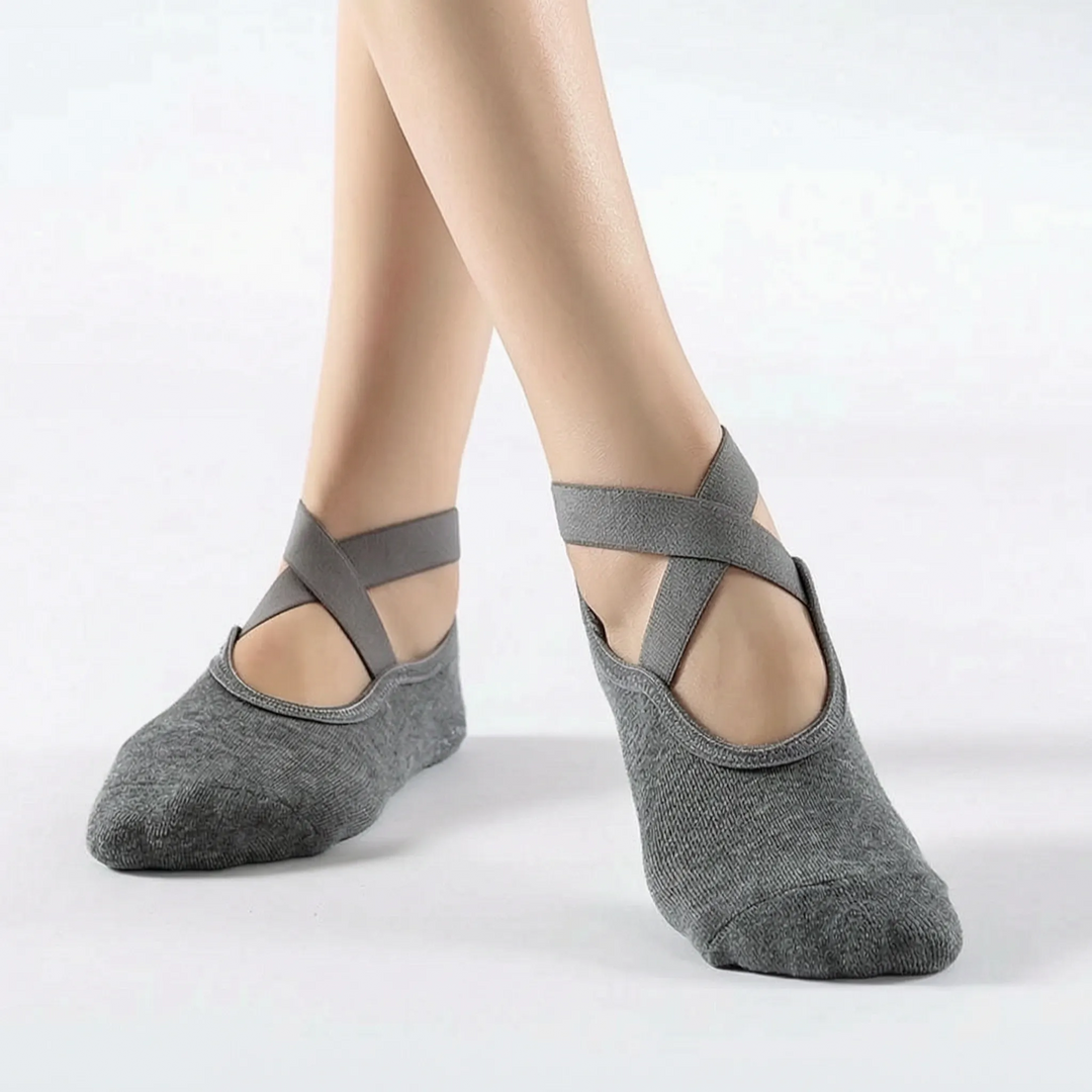 Perform confidently with women's non-slip athletic grip socks for yoga, pilates & studio exercise.
