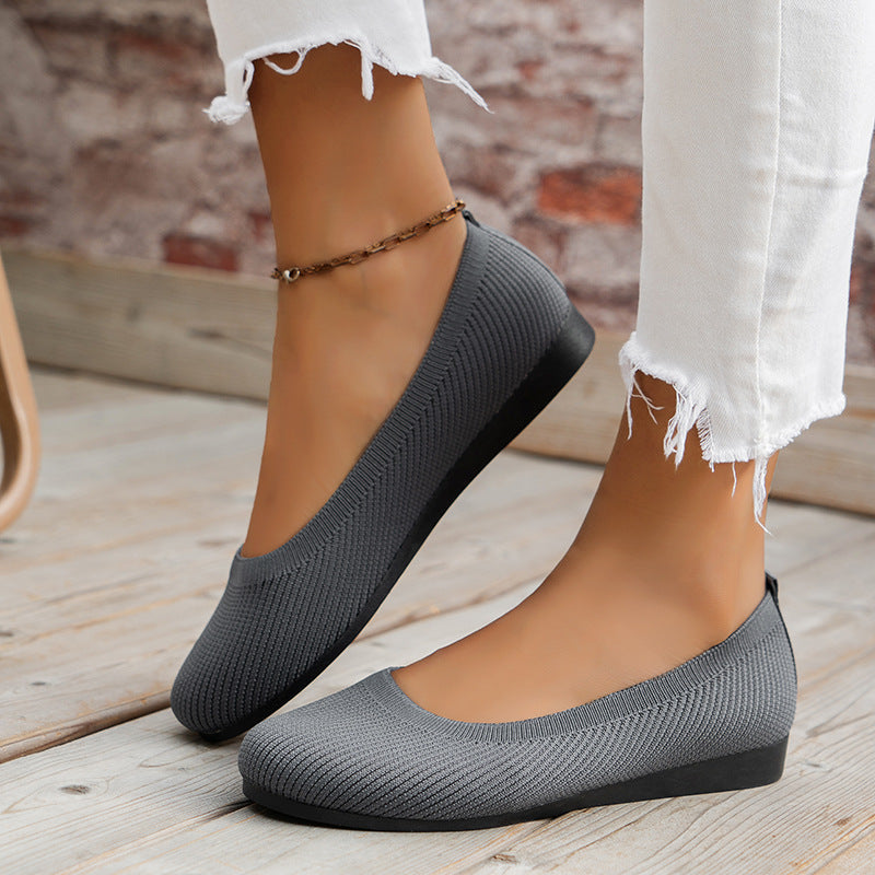 Front view of women's stylish orthopedic flats, comfortable beige ballerinas for everyday wear.