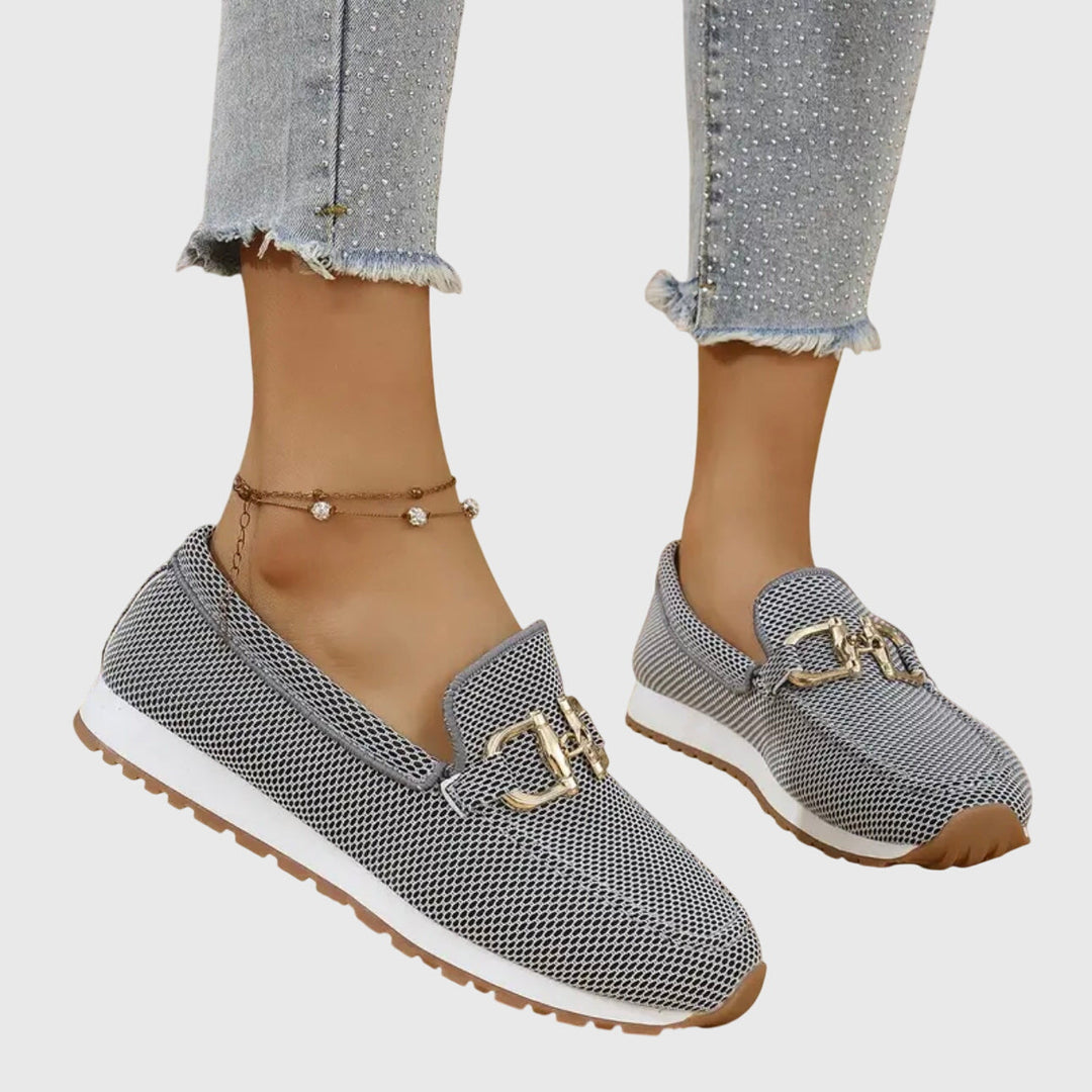 Comfortable women's walking loafers with cushioned support, ideal slip-ons for everyday wear & style.