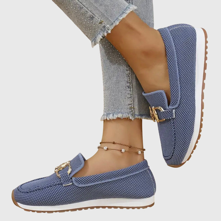 Black women's slip-on loafers, orthopedic design with superior cushioned support for all-day comfort.