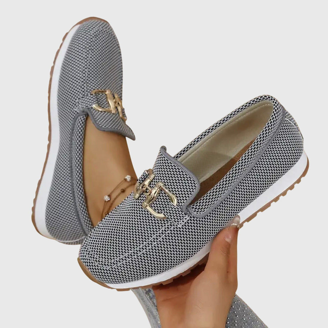 Stylish women's comfort loafers featuring a chic metal detail, orthopedic cushioned support for daily wear.