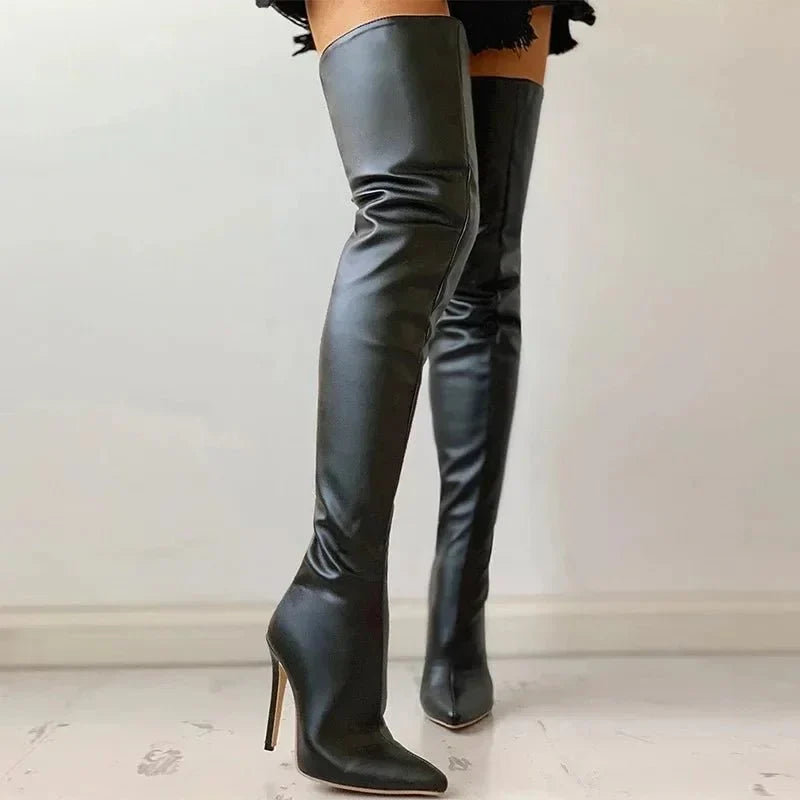 Luxe black over-the-knee boots with a pointed toe, slim fit, and elegant stiletto heel for women's fashion.