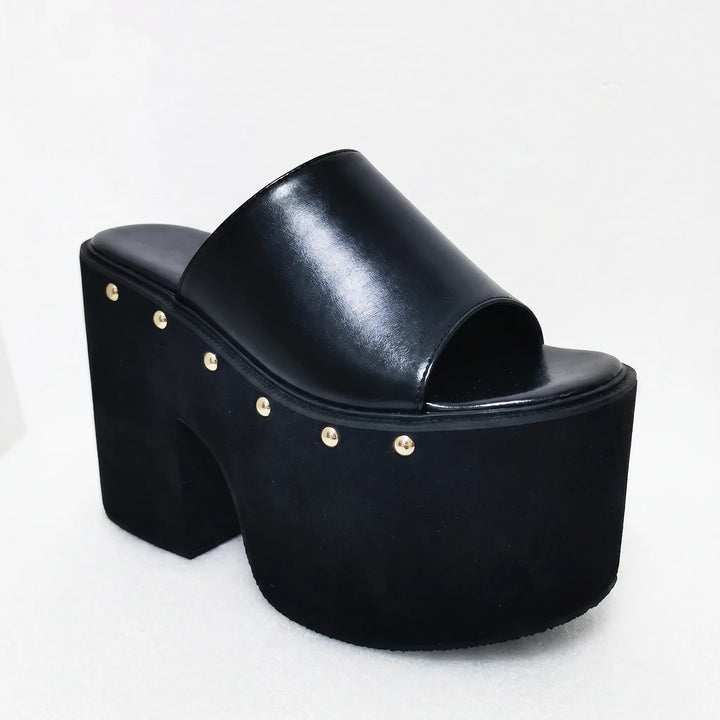 Chic women's black platform sandals with chunky block heel. Slip-on design for summer fashion.