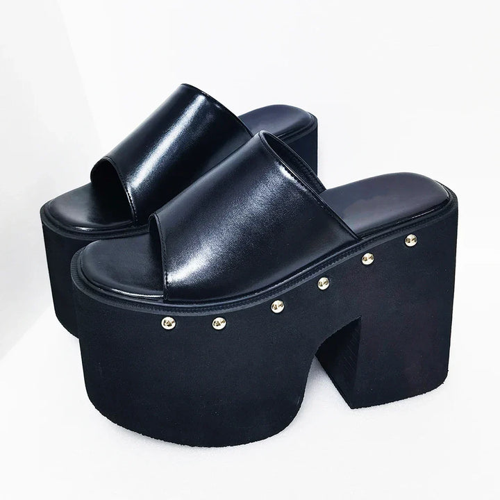 Elegant women's black open-toe platform sandals with a sturdy high block heel. Slip-on style.
