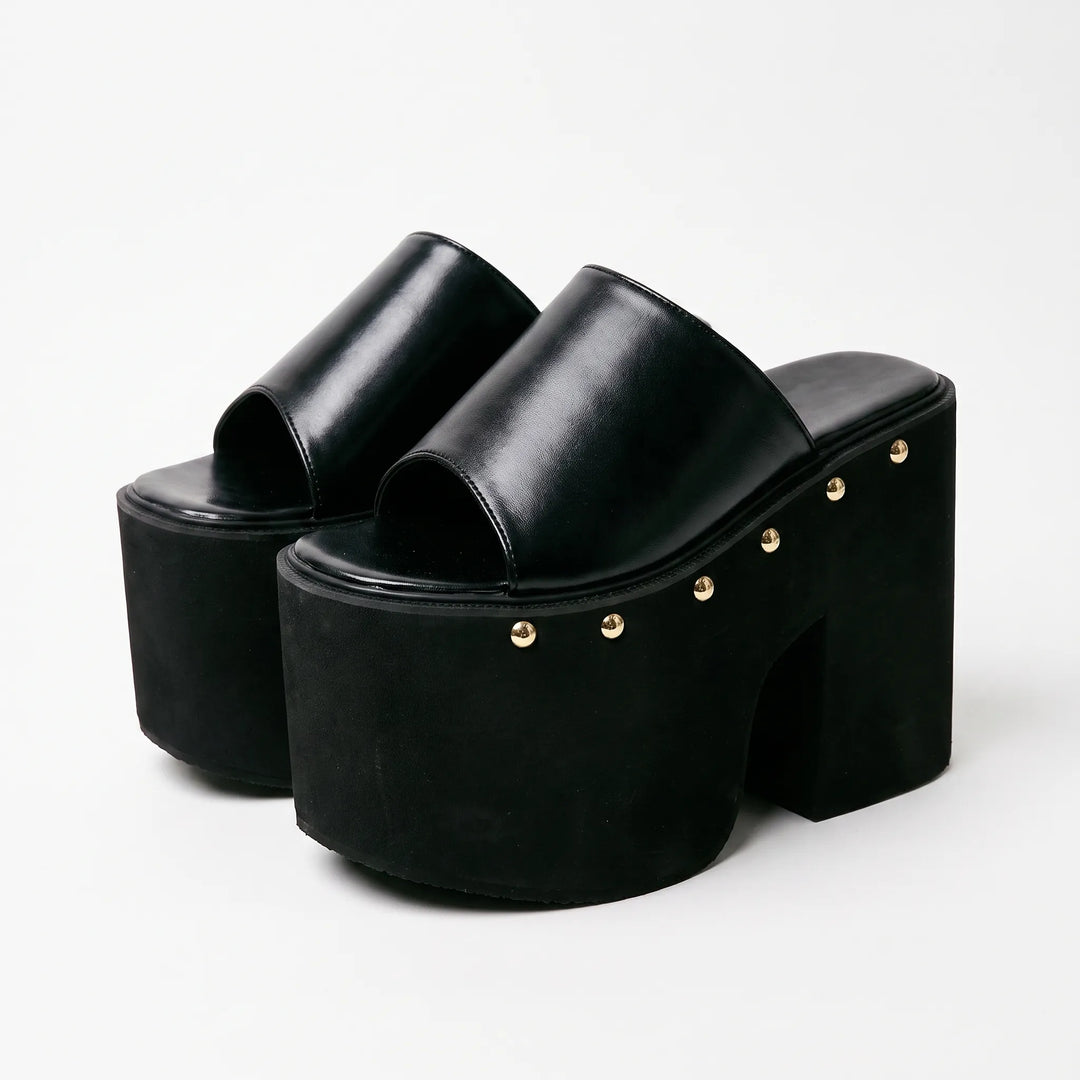 Stylish black platform sandals for women with high block heel. Versatile summer and party heeled sandals.