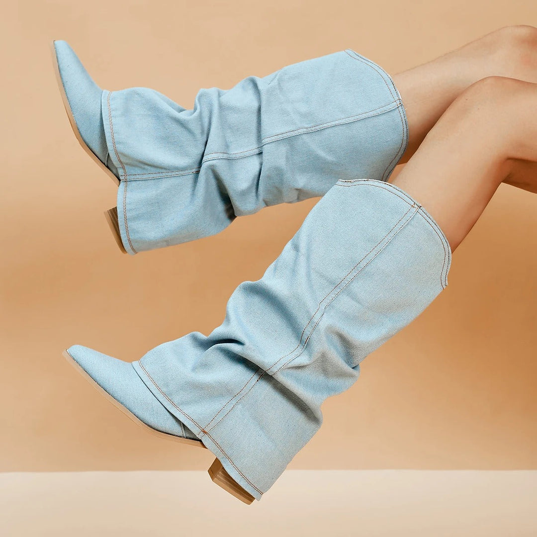 Stylish women's tall block heel boots with a sophisticated pleated texture and sharp pointed toe.