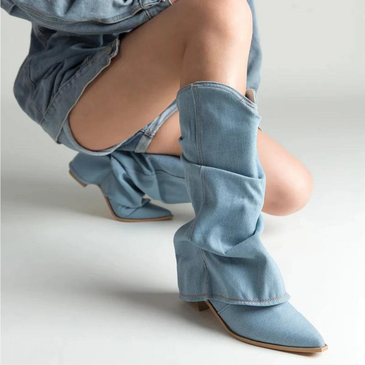 Elegant women's pleated pointed-toe tall block heel boots, ideal as comfortable dress boots for winter.