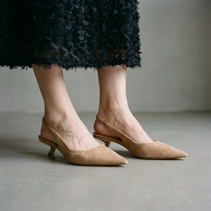 Women's black pointed toe kitten heel slingback sandals. Elegant office & evening dress shoes.