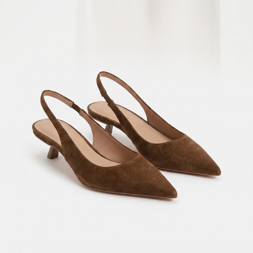Versatile women's pointed toe kitten heel slingback sandals. Great for office, evening, or summer fashion.