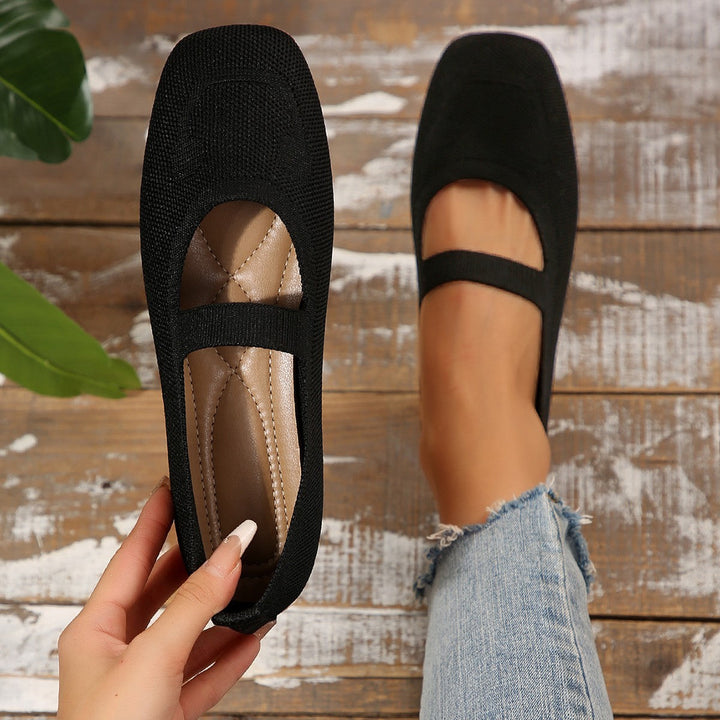 Stylish & comfortable women's smiling face Mary Jane ballet flats for versatile casual wear. Slip-on design.
