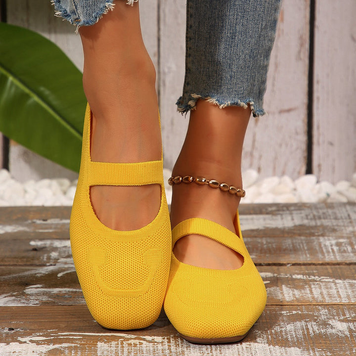Everyday women's ballet flats, the smiling face Mary Jane style ensures comfort & adds a playful touch.