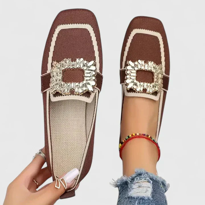 Fashionable women's square toe mules with a chic rhinestone buckle, ideal as modern slip-on flat shoes.