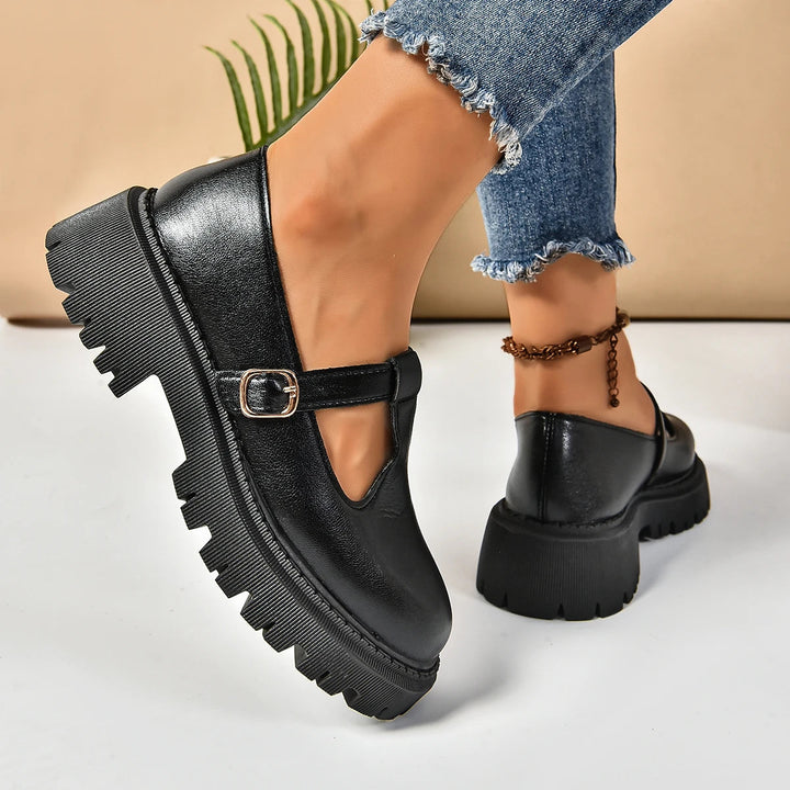 Orthopedic T-strap platform Mary Jane shoes for women, offering foot support & all-day comfort in black.