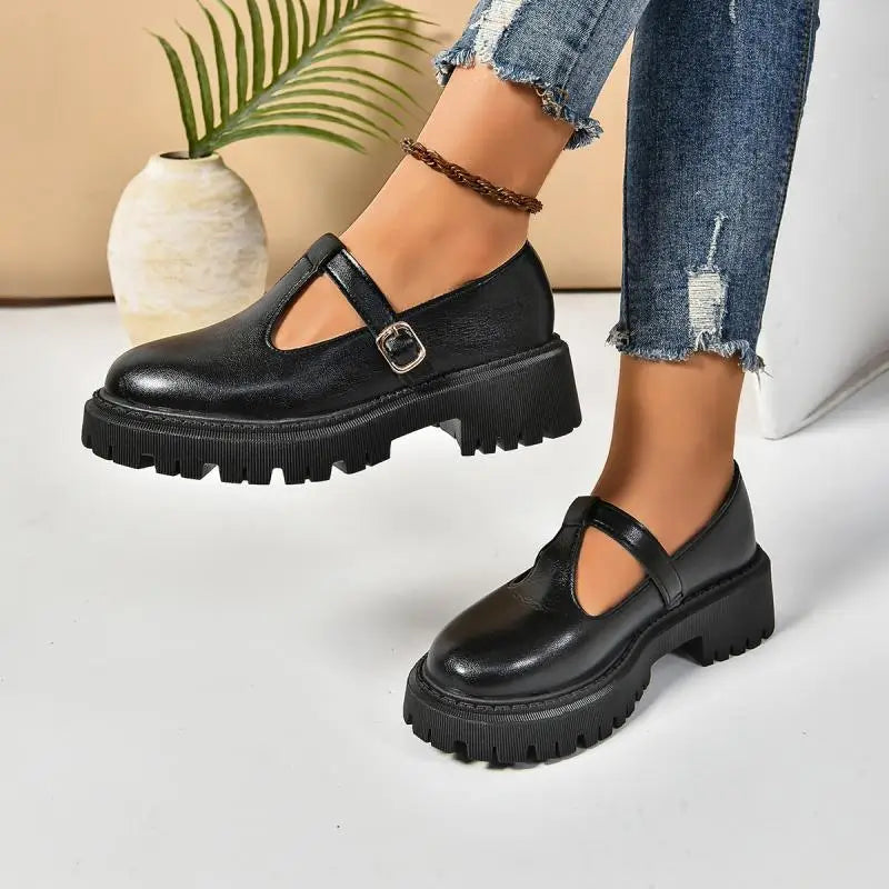 Comfortable black women's T-strap platform Mary Jane shoes with orthopedic foot support and a vintage look.