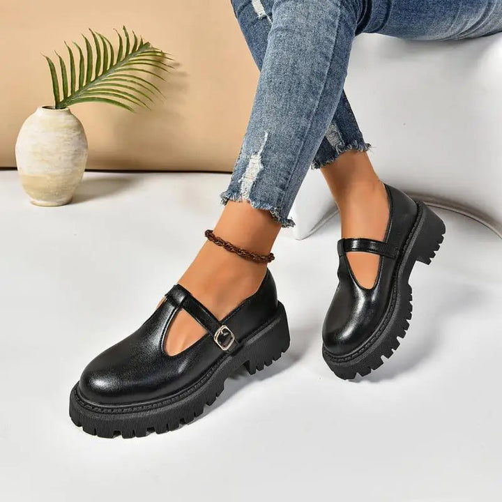 Women's round toe T-strap platform Mary Jane shoes with buckle closure, designed for comfort & retro style.