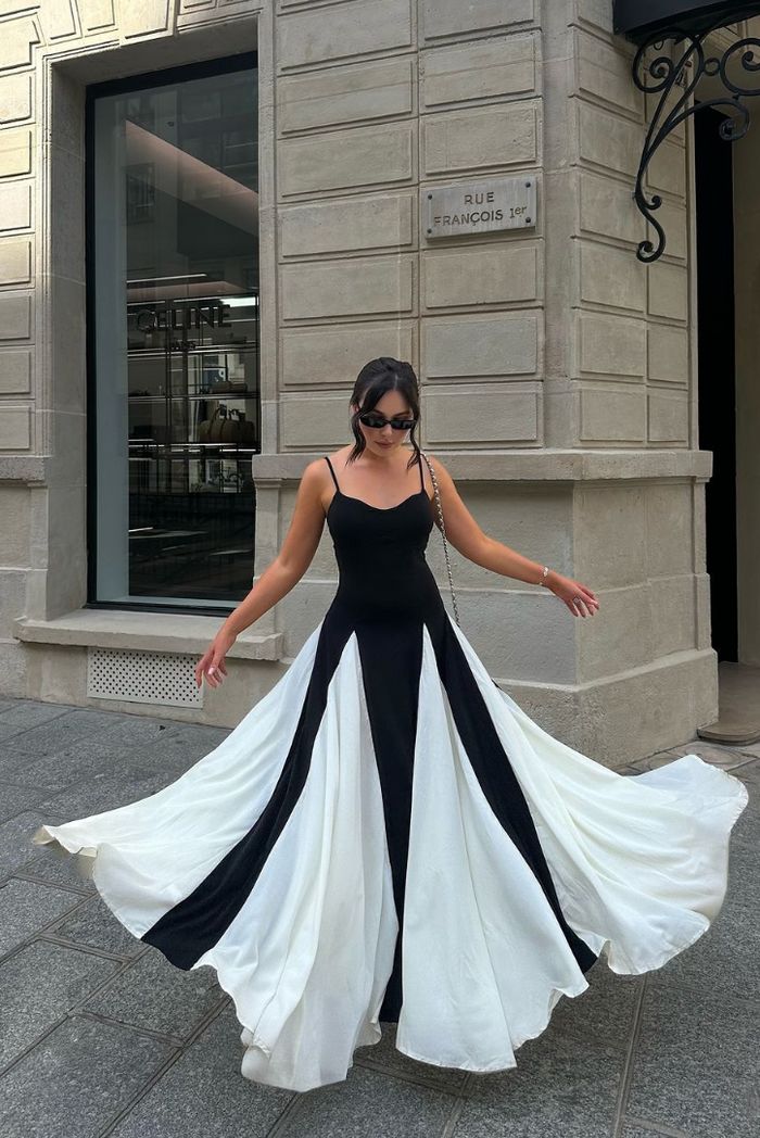 Elegant women's fashion: black & white contrast panel maxi dress, perfect for special occasions.