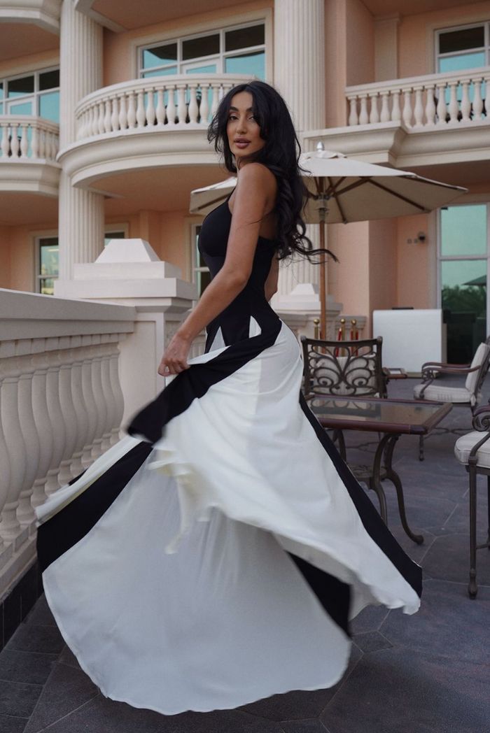 Modern black & white contrast maxi dress for women, ideal for weddings, galas, or formal events.