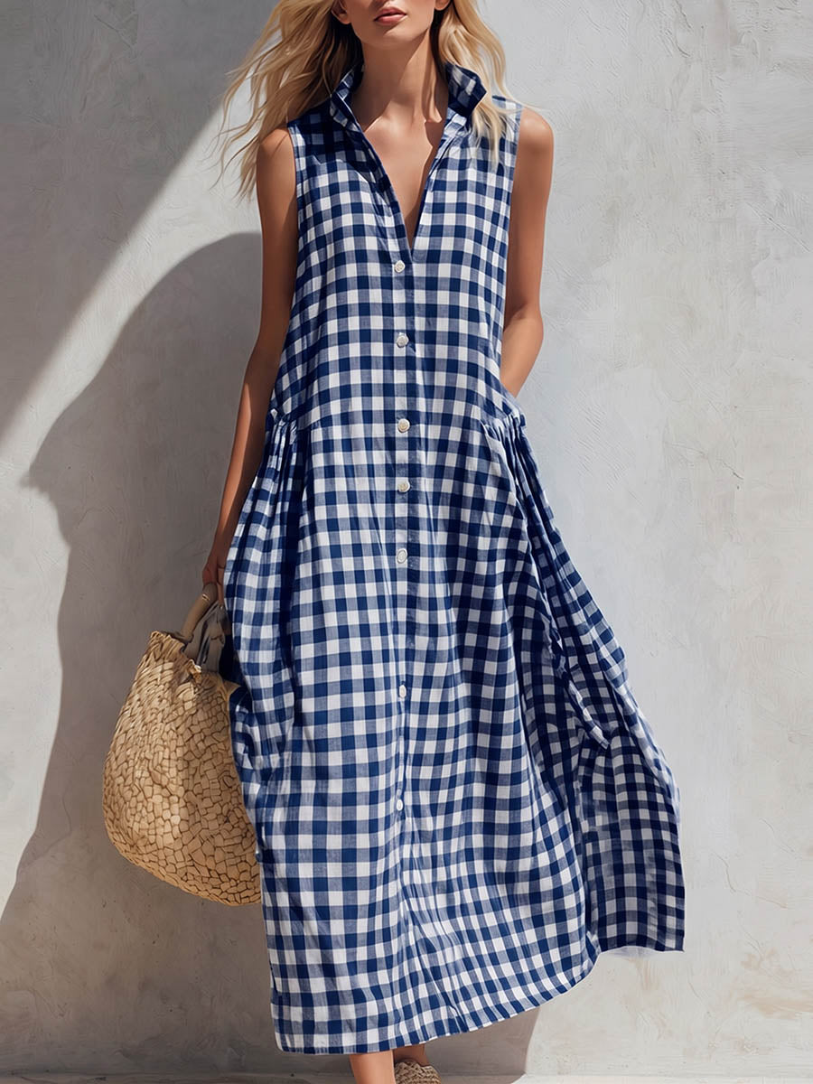 Chic women's gingham check print maxi dress. Sleeveless, collared, and relaxed for warm weather comfort.