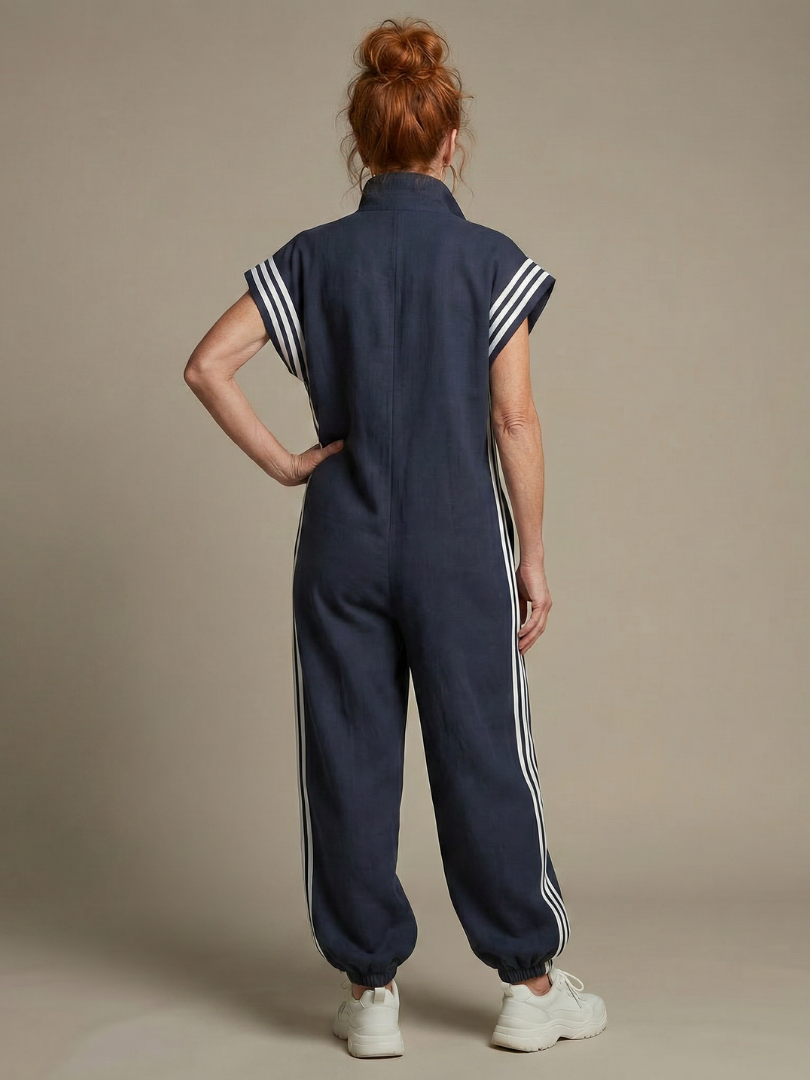 Casual black women's jumpsuit, zip front, relaxed fit, with sporty side stripes for a fashionable look.