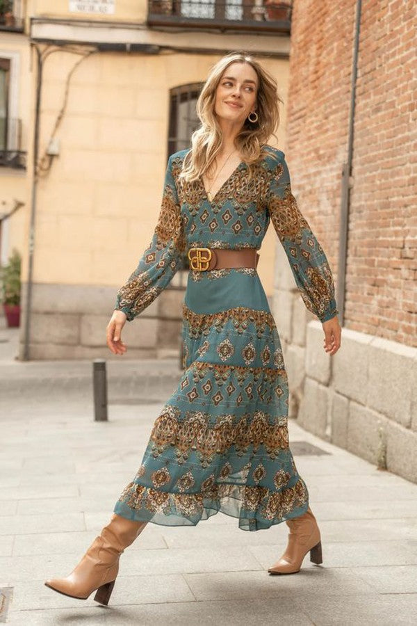 Flowy blue bohemian midi dress for women featuring an intricate medallion print and stylish puff sleeves.