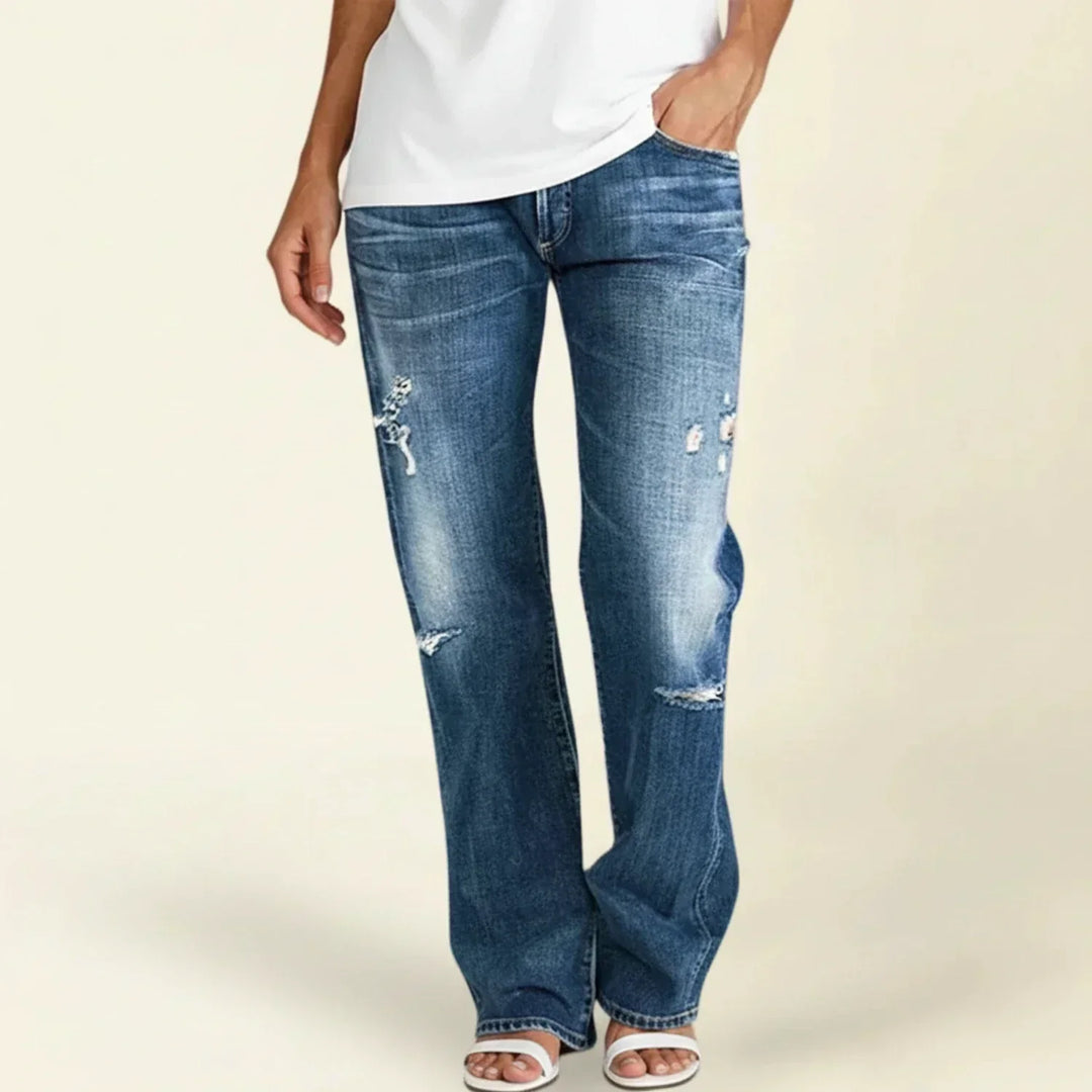 Women's blue high waist ripped straight leg jeans, distressed denim for casual everyday fashion.
