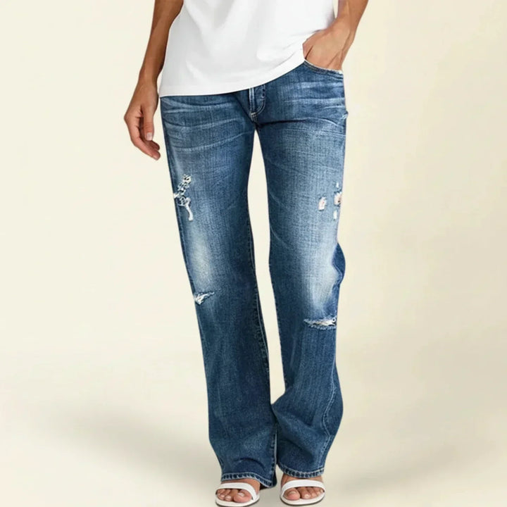Women's blue high waist ripped straight leg jeans, distressed denim for casual everyday fashion.