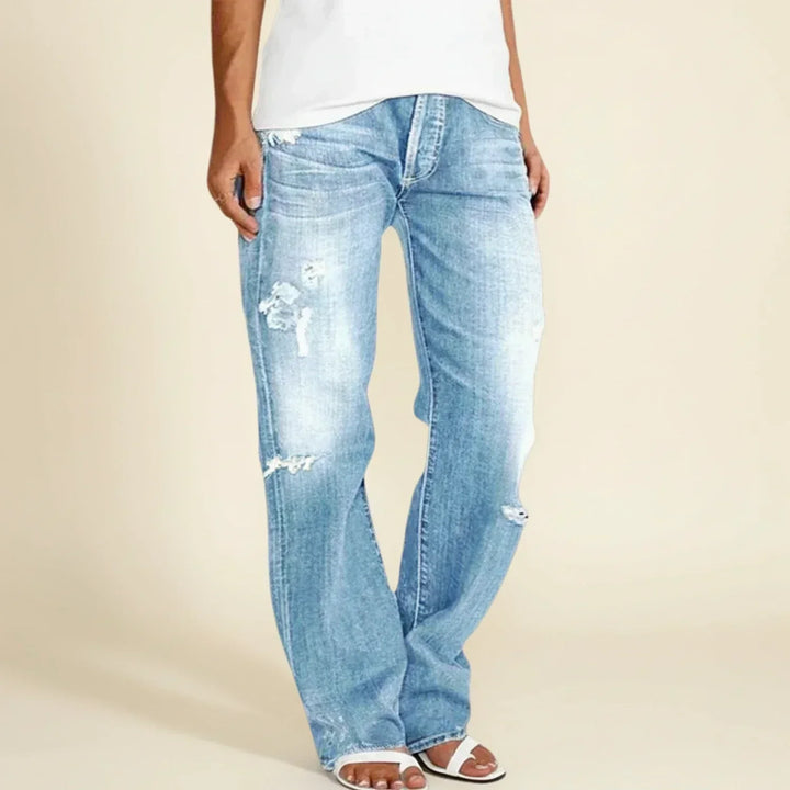 Stylish women's ripped high waist straight leg jeans, versatile denim for casual outfits.