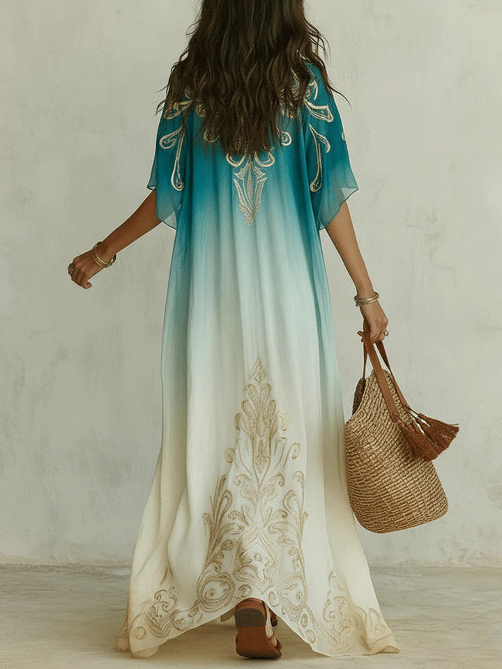 Comfortable women's blue ombre flowing kaftan maxi dress, V-neck, casual boho style for beach & resort.