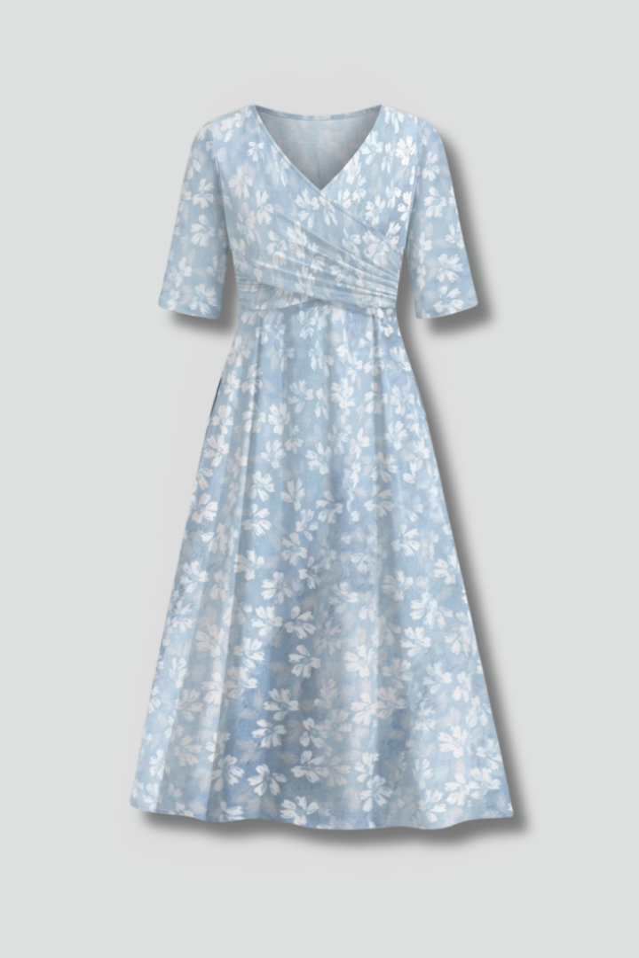 Women's blue V-neck midi dress with short sleeves & side pockets, perfect for casual everyday comfort & style.